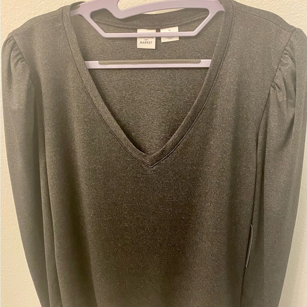 Long sleeves one piece top with two button closer / brand New with tags